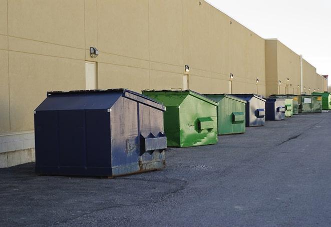 dumpsters lined up for use on busy construction site in Bethel, MN